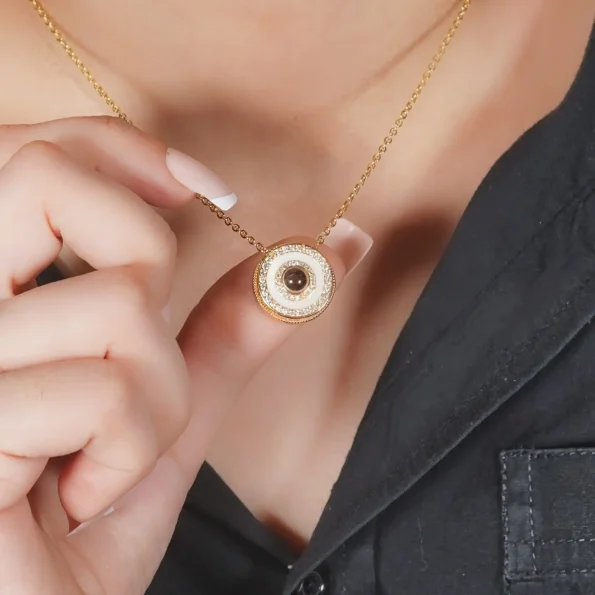 Woman wearing gold halo necklace, a stylish and versatile accessory