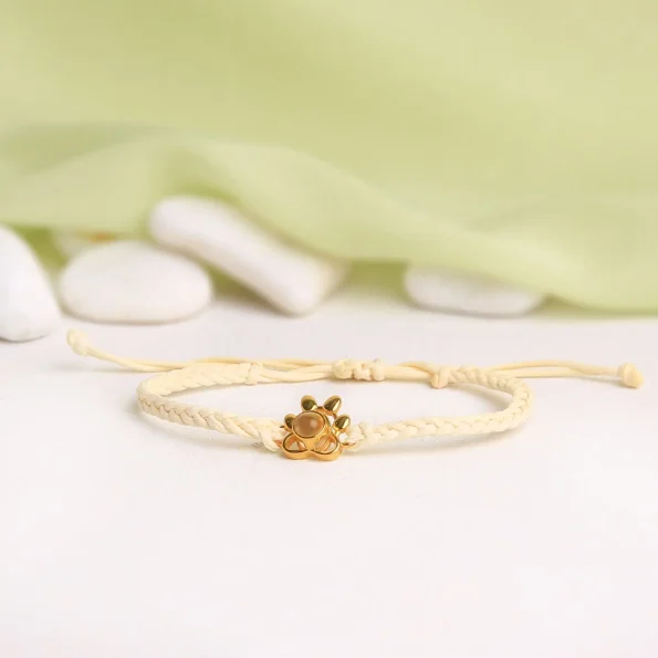 Neutral beige pet paw photo bracelet for a subtle and warm look