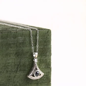 Elegant silver fan-shaped necklace, a unique personalized keepsake with hidden photo