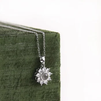 Elegant silver flower charm necklace, perfect for a delicate touch