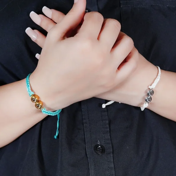 Girl wearing turquoise and white double pendant rope bracelets – lifestyle custom jewelry for everyday style