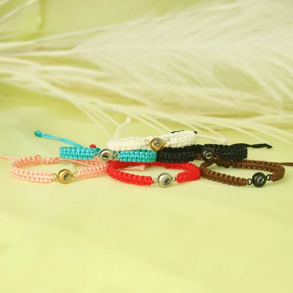 Group of braided rope photo bracelets in red, brown, black, and white – personalized collection for meaningful keepsakes