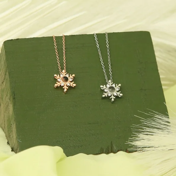 Collection of snowflake necklaces in silver and rose gold, timeless keepsakes for any style
