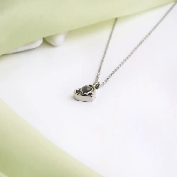 Silver heart locket necklace with a timeless design for cherished memories