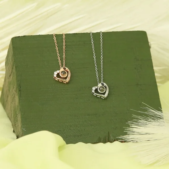 Collection of heart mini zircon necklaces in silver and rose gold, perfect for a stylish and meaningful accessory ensemble