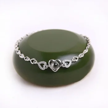 Silver heart zircon bracelet with hidden photo, adding a touch of elegance