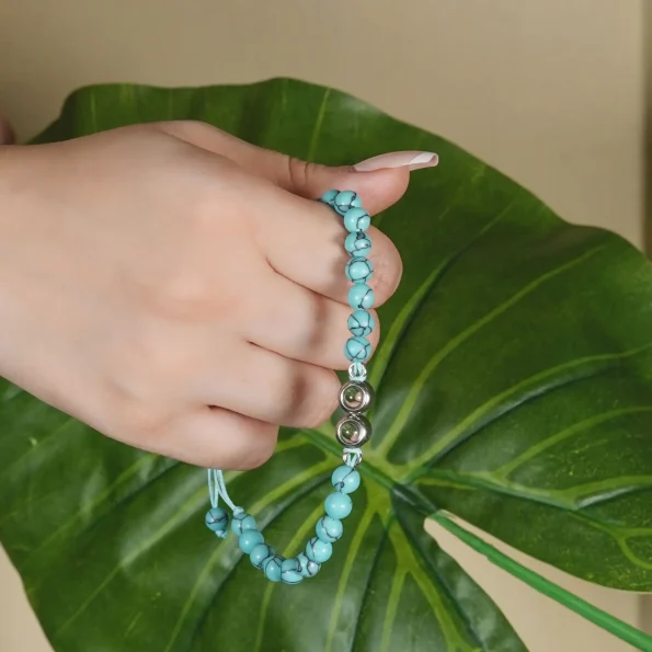 Model wearing turquoise frosted stone projection bracelet – fashion-forward personalized jewelry