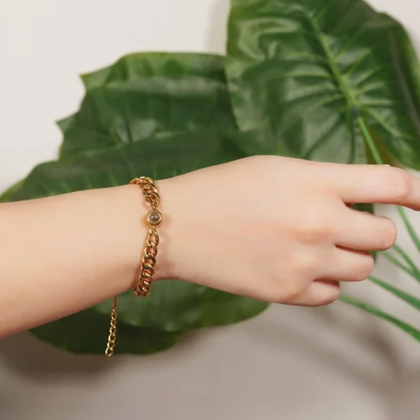 Model wearing gold Cuban photo bracelet – personalized accessory for men or women, perfect for birthdays, anniversaries, or memorial gifts