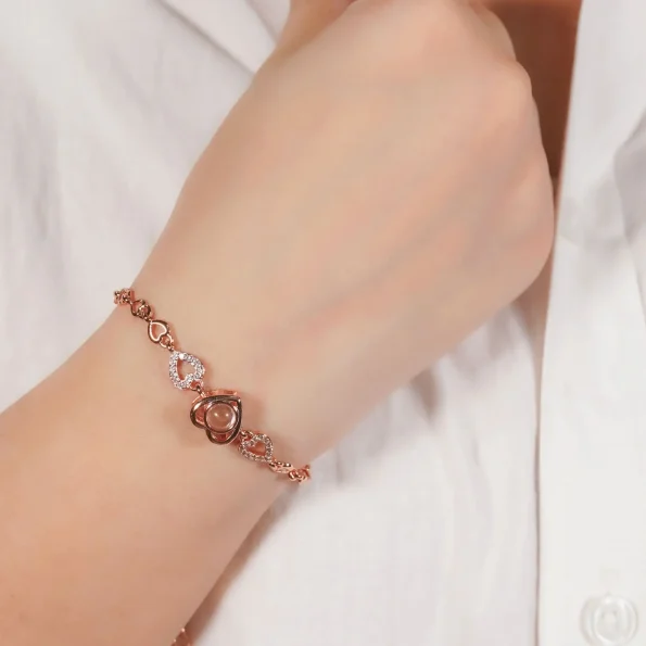 Model wearing rose gold heart zircon bracelet, a fashionable keepsake accessory