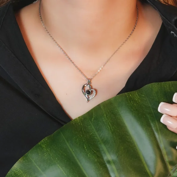 Girl wearing silver icy heart necklace – fun, personalized jewelry to capture cherished memories