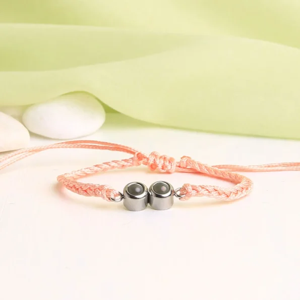 Pink double pendant rope bracelet