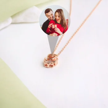 Rose gold angel pendant with a hidden photo space, adding a personal touch
