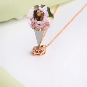 Rose gold apple locket necklace, a meaningful piece to hold a cherished photo