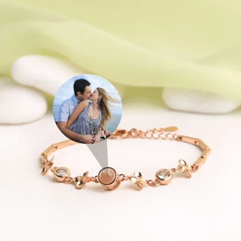 Rose gold four-leaf photo bracelet with sparkling zircon stones