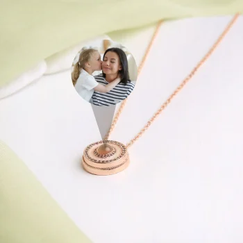 Delicate rose gold halo pendant, perfect for a timeless, elegant look
