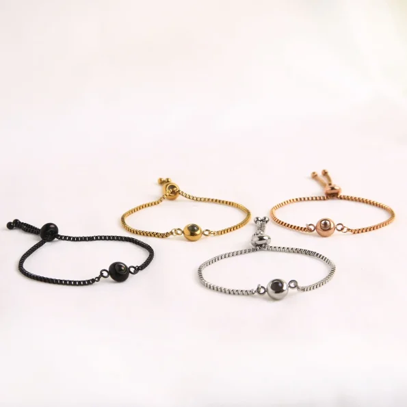 Group of round bracelets in silver, gold, rose gold, and black for versatile style