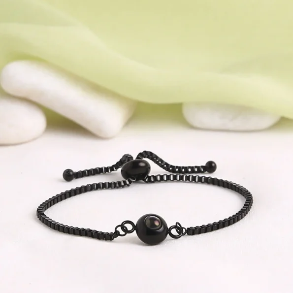 Chic black round bracelet, adding a bold touch to any look