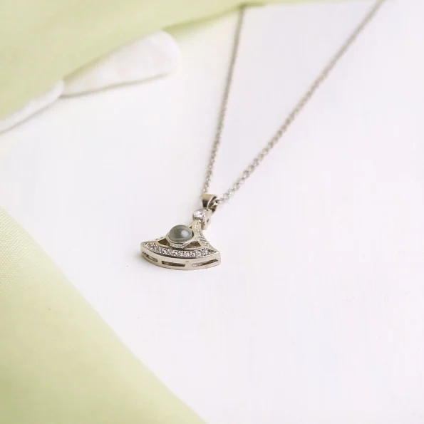 Silver fan-shaped necklace with hidden picture, a stylish memory holder