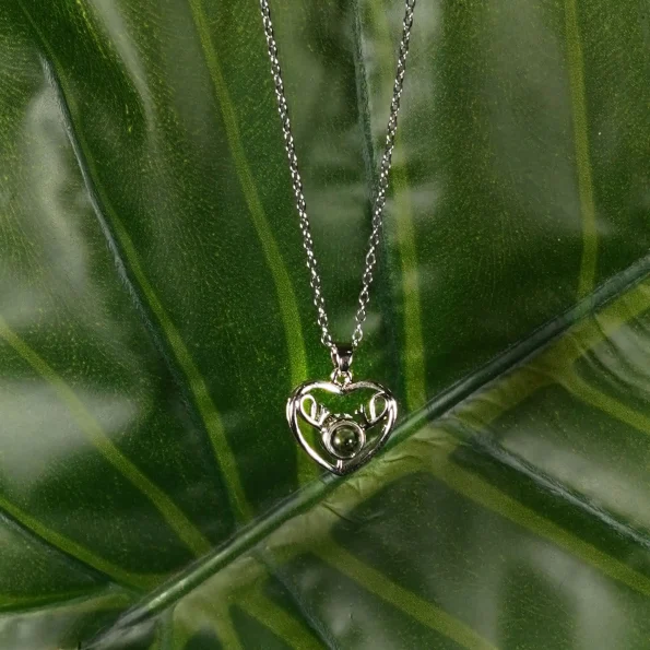 Unique silver heart deer necklace, designed to hold precious memories