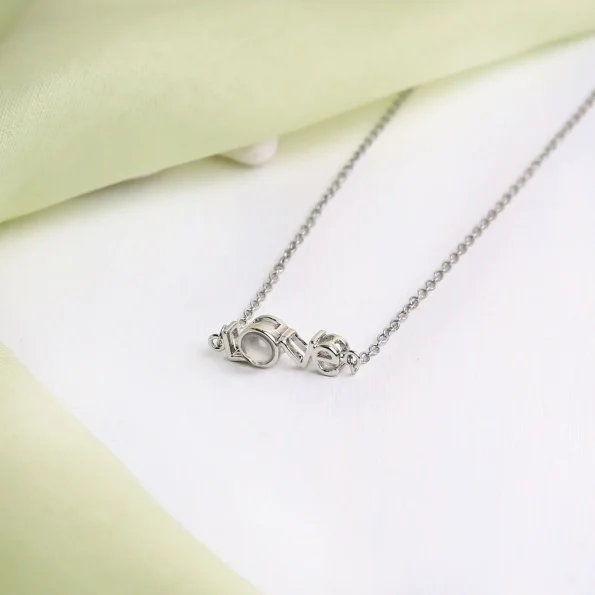 Silver love letter necklace with a sentimental touch