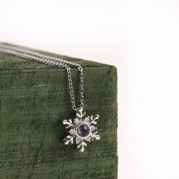 Silver snowflake pendant with hidden photo, a timeless winter-inspired keepsake