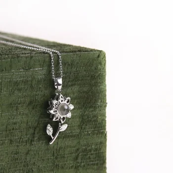 Timeless silver sunflower necklace with photo inside for a personal touch