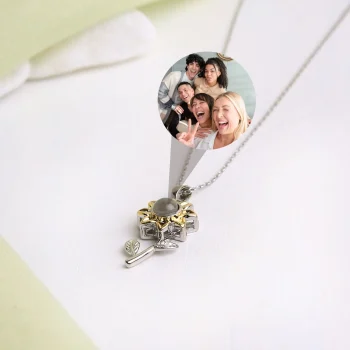 Gold and silver sunflower photo locket, a stylish keepsake with hidden memories