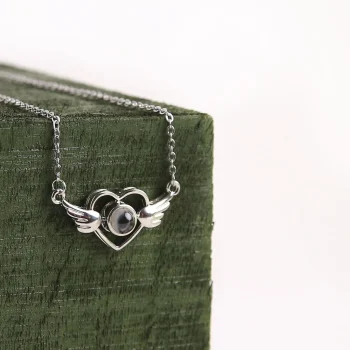 Timeless silver wings heart necklace, a beautiful pendant for holding cherished memories close