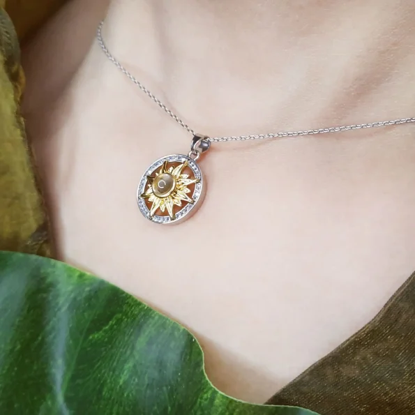 girl wearing sunflower locket