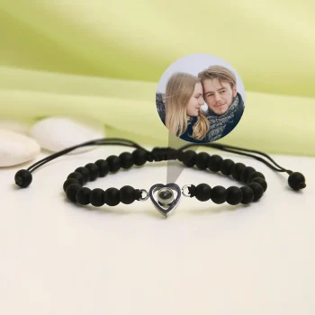 Modern black frosted stone heart bracelet with a hidden photo, a stylish keepsake for treasured memories.
