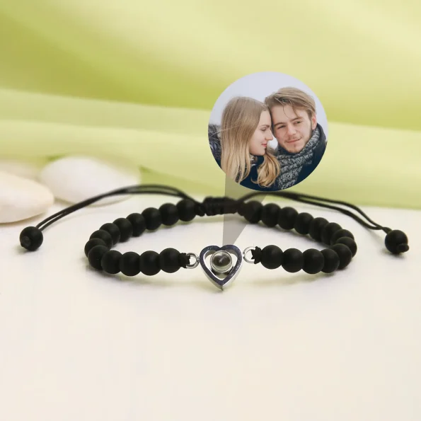 Modern black frosted stone heart bracelet with a hidden photo, a stylish keepsake for treasured memories.
