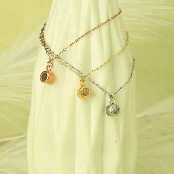 Group shot of charm bracelets in gold, silver, and rose gold, showcasing timeless beauty.