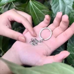 silver pet photo keychain with hidden picture
