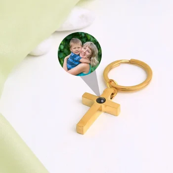 Gold Bible verse cross keychain, a meaningful accessory representing strength and spirituality.