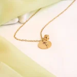 silver birthflower photo necklace close-up intricate detail