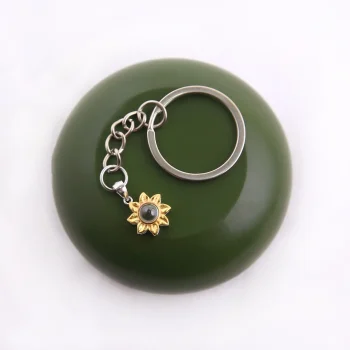 Radiant sunflower photo keyring with hidden projection, a meaningful way to keep loved ones close.