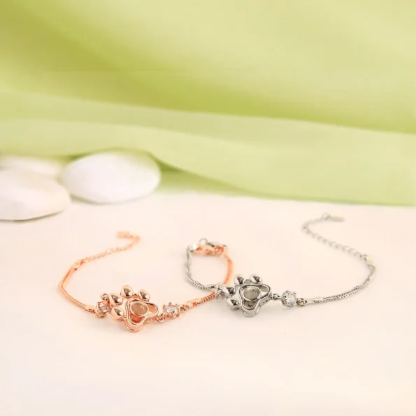 A sentimental pet paw charm bracelet set—perfect for keeping your furry friend’s memory close.