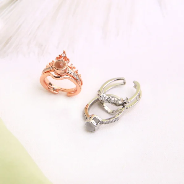 Group shot of silver and rose gold crown photo rings, a perfect blend of elegance and personal meaning.