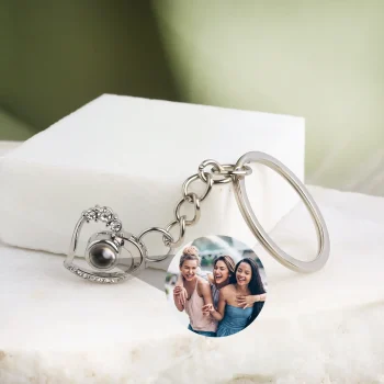 Elegant heart-shaped keychain with a hidden photo projection, a keepsake of cherished memories.