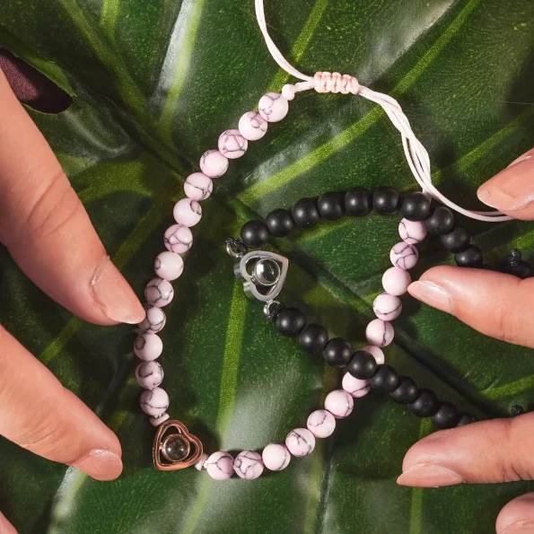 Frosted stone heart bracelet with a leaf-inspired background, blending nature’s beauty with treasured memories.