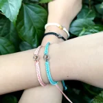 cream rope projection bracelet close-up sentimental jewelry