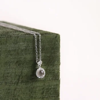 Elegant silver petite halo necklace with a delicate shine, perfect for everyday elegance.