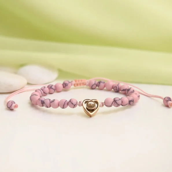 Charming pink frosted stone heart bracelet with a secret photo, a heartfelt gift full of love.