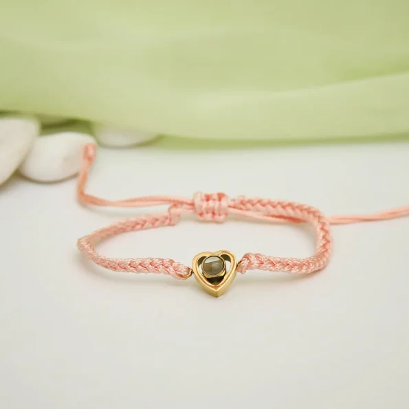 Pink rope heart bracelet with a hidden photo, a perfect gift for treasured memories.