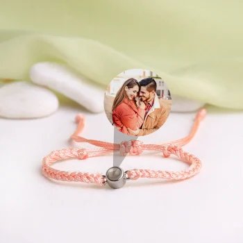 Charming pink rope projection bracelet with a hidden photo, a heartfelt keepsake for someone special.