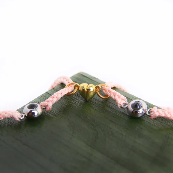 Delicate pink set of 2 photo bracelets, a sentimental keepsake to cherish special moments forever.
