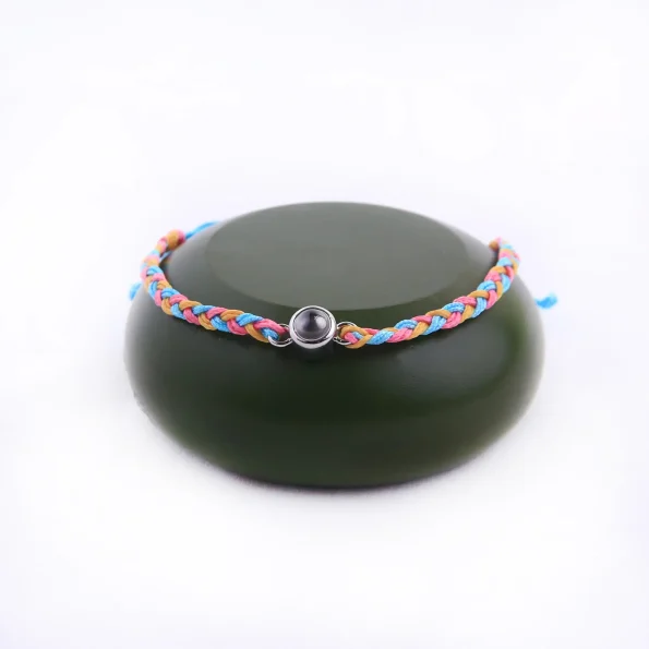 Extra vibrant rainbow photo rope bracelet, an added burst of color to carry your treasured memories in style.