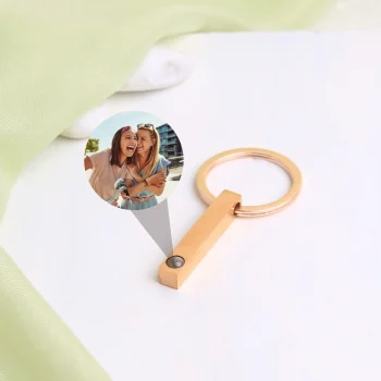 Charming rose gold bar photo keychain with a hidden photo holder, a sentimental accessory to carry your favorite moments.