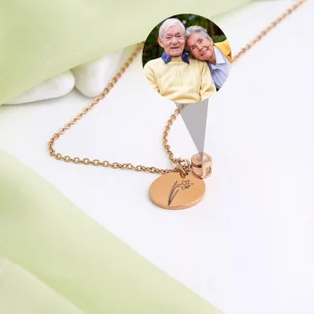 Delicate rose gold birthflower photo necklace, capturing memories and the beauty of nature in one piece.