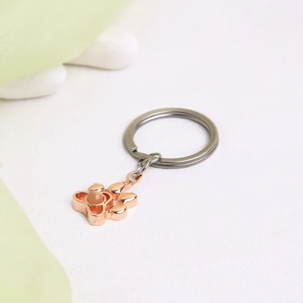 Rose gold custom pet photo keychain, a heartfelt personalized gift to treasure special memories.